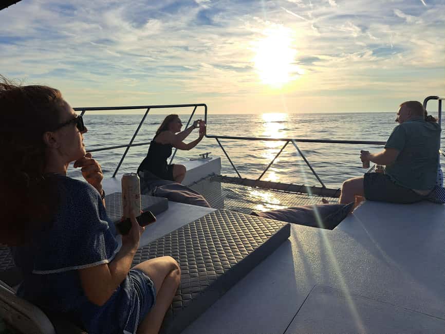 Rovinj: Sunset & dolphin group tours with Catamaran - Getting Oriented Fast: ACI Marina Meet-Up and Sunset Timing