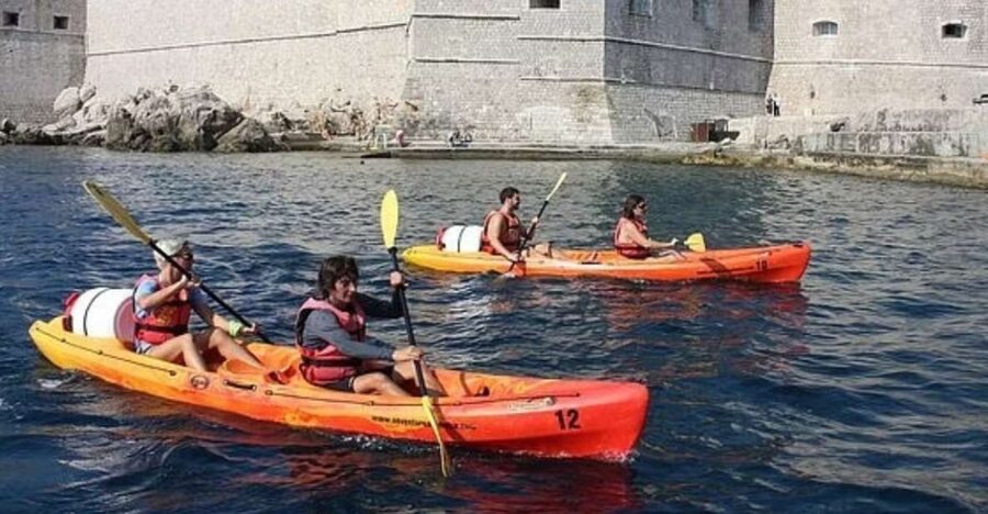 Sea Kayaking - Paddling Out of Sulic Beach With Dubrovnik’s Walls Nearby