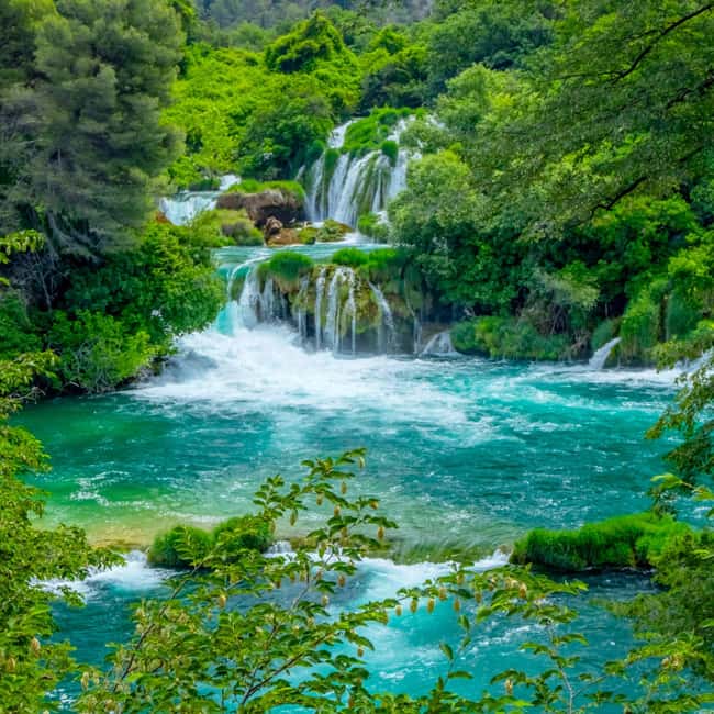 Šibenik or Zadar: Krka falls, olive mill, oil & wine tasting - Skradinski Buk waterfall walk: boardwalks, pools, and timing