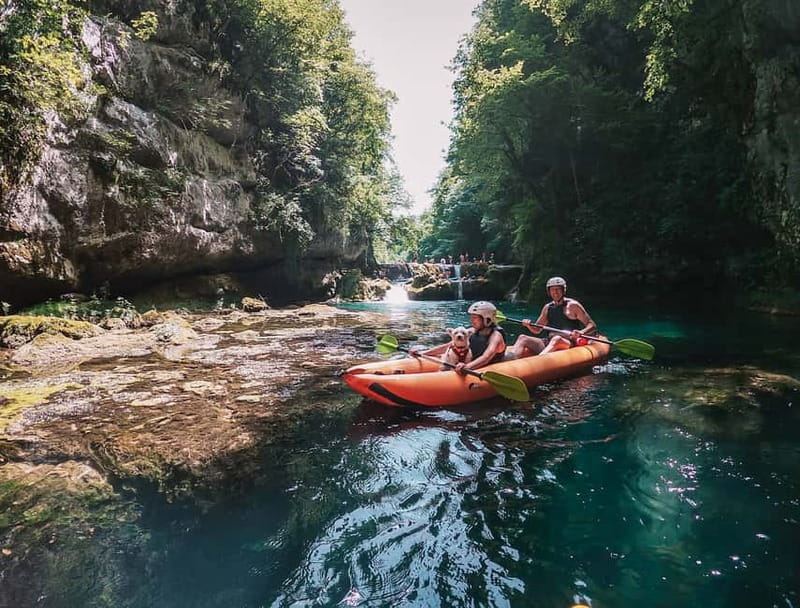 Slunj: River and Waterfalls Kayaking on Mrežnica river - End of the route: camp vibes, a bridge, and back to the hotel