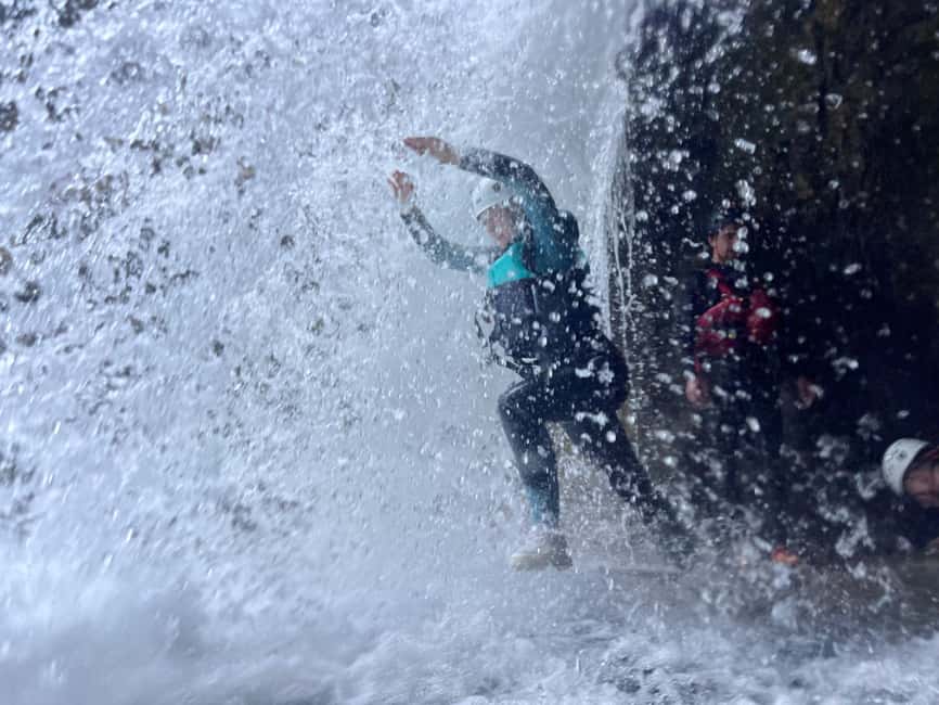 Small Group Canyoning with proffesional guide - The abseil: the moment you feel the height