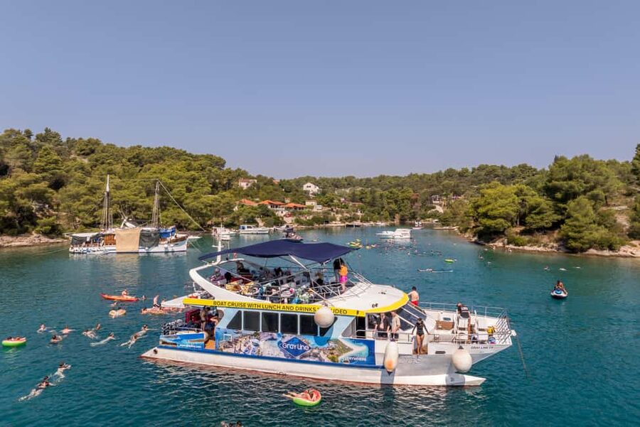 Split: Blue Lagoon & 3 Islands hopping with Lunch & Drinks - Krknjaši Blue Lagoon on Drvenik: turquoise swimming time, snorkel kit, and real play options