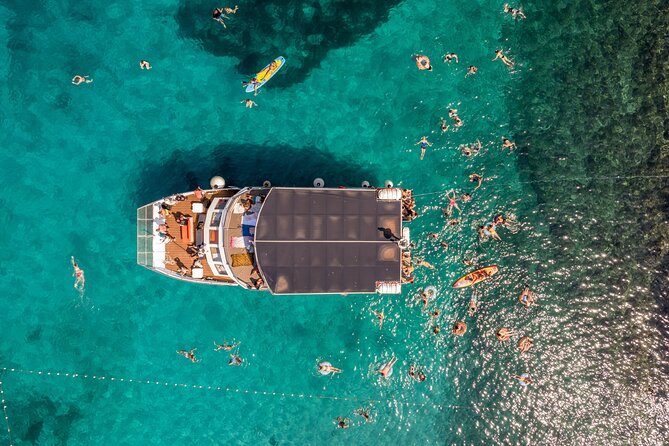 Split: Hvar, Brač, and Pakleni Cruise with Lunch and Drinks - Pakleni Islands: Swim, Snorkel, and Paddle While the Sea Looks Fake