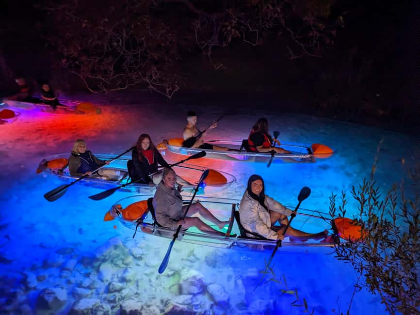 Split: Illuminated Evening Guided Kayaking Tour - Back to the sea: cliffs, houses, and Split glowing from the shoreline