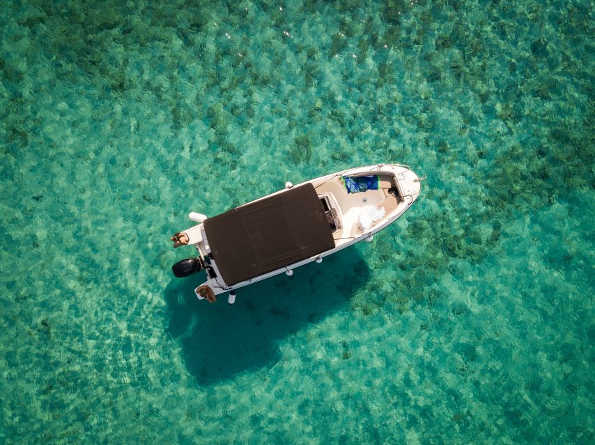 Split: Private Full Day Boat Trip to Blue Lagoon and Trogir - Maslinica: small village streets and real local coastal life