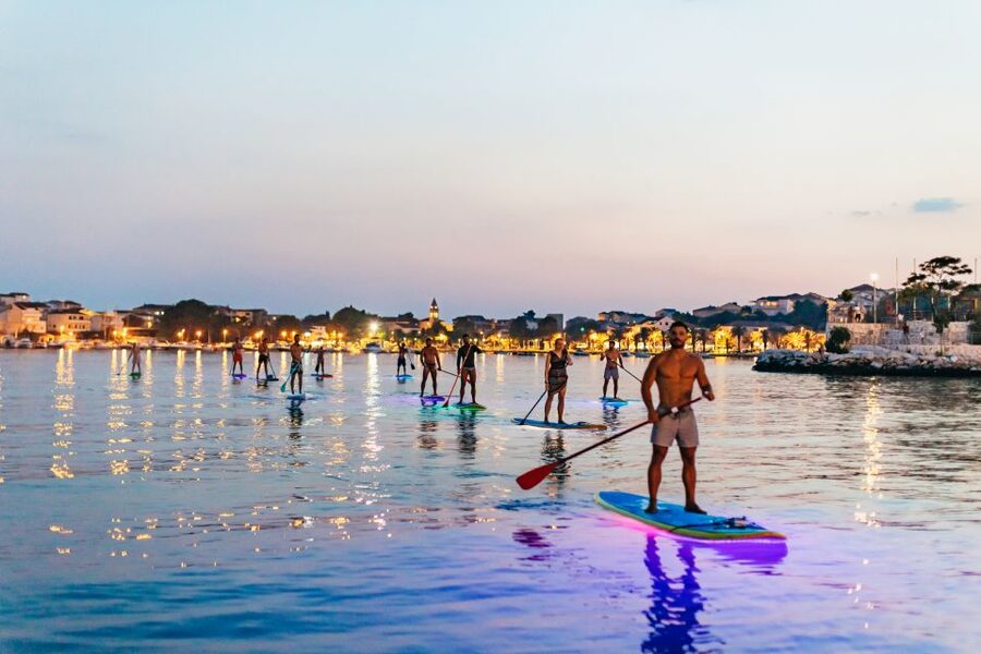 Split: Stand Up Paddleboard Night Glow Tour - Safety briefing that makes beginners feel normal