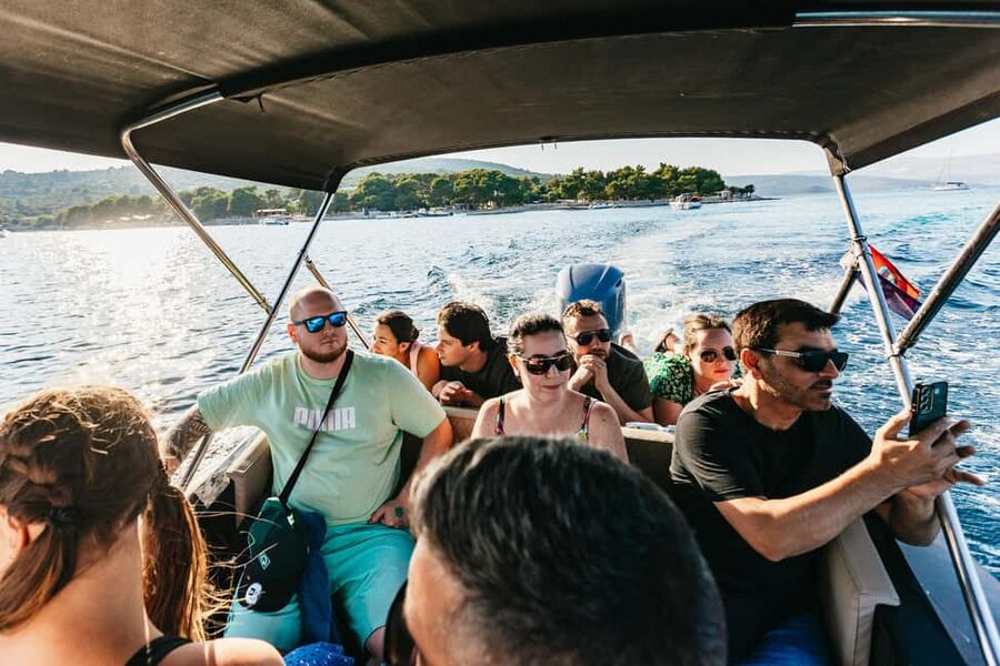 Split/Trogir: Blue Lagoon and 3 Islands Speedboat Tour - Blue Lagoon Snorkel Time: Provided Gear, Pine-Backed Pebble Beach, and Beach Club Lunch