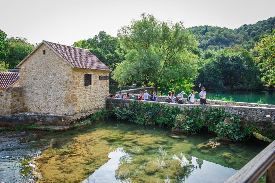Split/Trogir: Krka National Park Day Trip & Boat to Skradin - The renovated stone houses and watermill walk: a different kind of stop