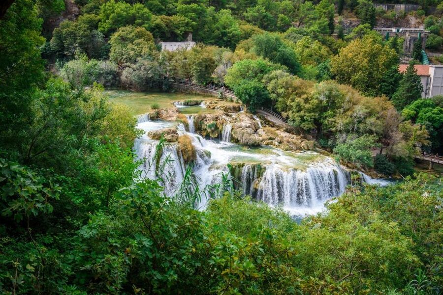 Split/Trogir: Krka National Park Day Trip with Wine Tasting - The boat ride through the Krka river canyon to Skradin