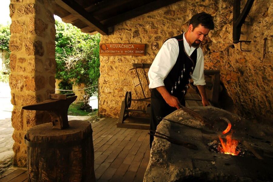 Split & Trogir: Krka Waterfalls & Swimming in Primošten - Primošten: Medieval Streets, Beach Time, and That UNESCO Wine Vibe