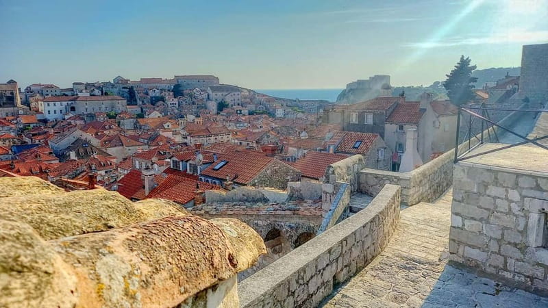Sunset Wall Walk: 75-Minute Guided Tour & Free Exploration - Price and tickets: what you pay for the guide, and what you must budget for entry