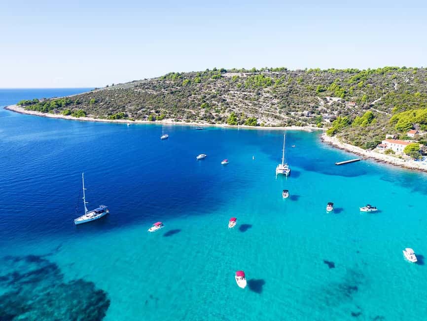 Trogir: Blue Lagoon, Maslinica, and Solinska Bay Boat Tour - Solinska Bay: pine shade, boat jumps, and snorkeling with a picnic option