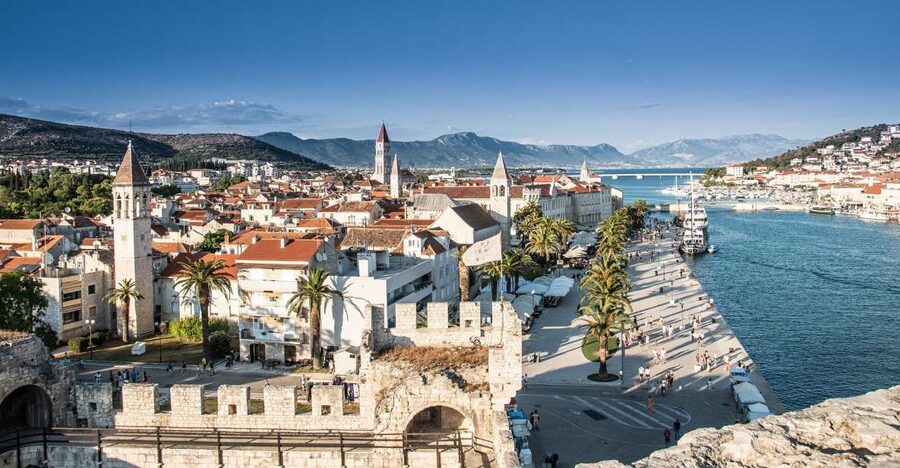 Trogir: Old Town Guided Walking Tour - Meeting the guide at the North Gate, blue umbrella is your shortcut