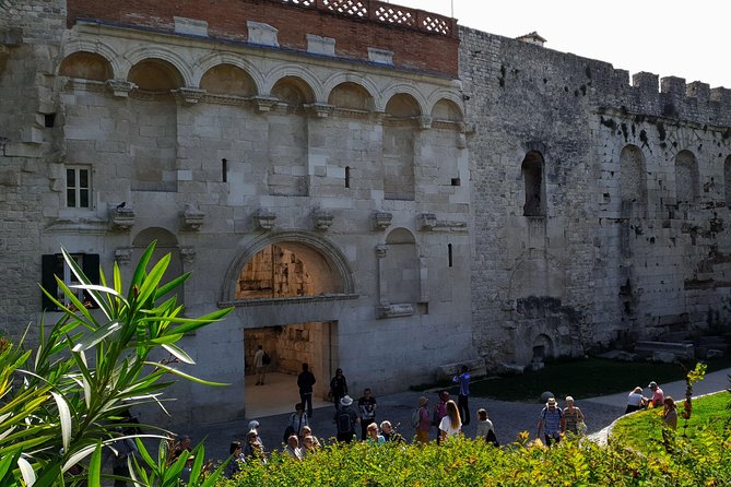 Walking Tour of Split with a 'Magister' of History - Stop 1: Riva Harbor sets the stage with Palace walls in view