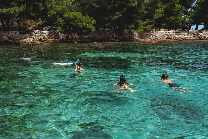 Zadar: 3 Islands Luxury Boat Tour with Aperol Spritz & Snorkeling - Stop 3: Skoljic Near Ugljan for Churches, Monastery Pieces, and Time to Wander