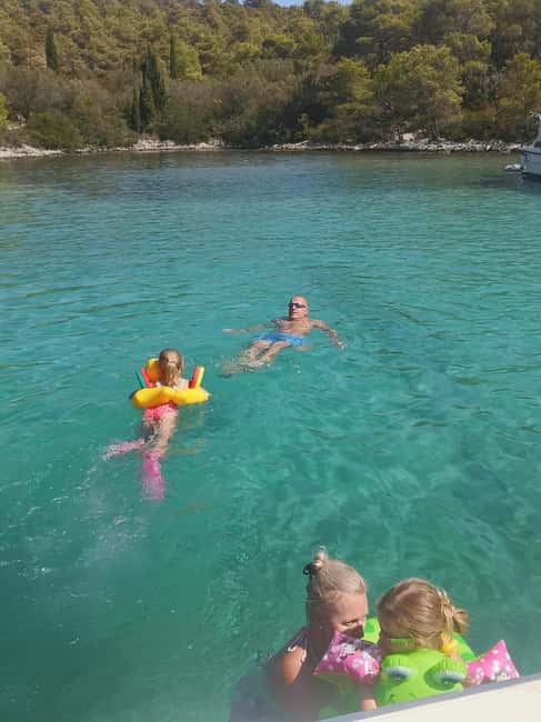 Zadar: 3-Stop Blue Lagoon & Snorkeling Cruise with Drinks - Stop 3: Preko, sandy beach breaks, and the Galevac monastery option
