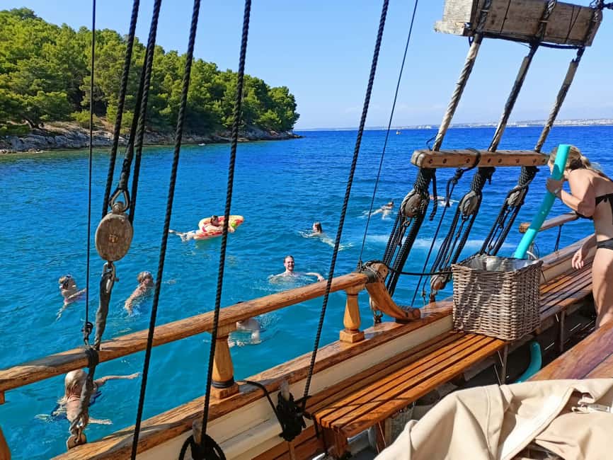 Zadar: Boat Tour with Unlimited Wine & 3 Stops - Kukljica first stop: beach time and snack options