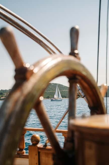 Zadar: Boat Tour with Unlimited Wine & 3 Stops - Sailing time, views, and why timing matters