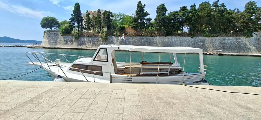 Zadar: Island Hopping Tour Swim and Snorkel with Aperol - Stop 1, the first anchored swim and snorkeling hour