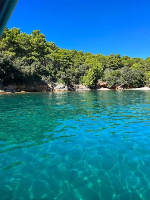 Zadar: Islands Speedboat Tour & Blue Bay Swim with Drinks - The First Swim Stop: Secluded Bay Water, Real Time in the Sun
