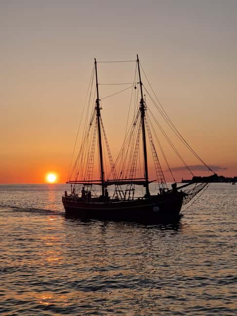 Zadar: Sunset Cruise on Traditional Boat with Wine - Stepping aboard a 120-year-old heritage vessel