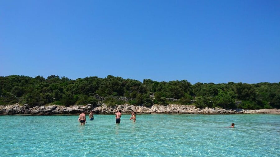 Zadar to Sakarun Beach Tour, Shipwreck Dive & Tunnel - 4,5hr - Stop 2: Sakarun Lagoon beach time, swimming, and shade