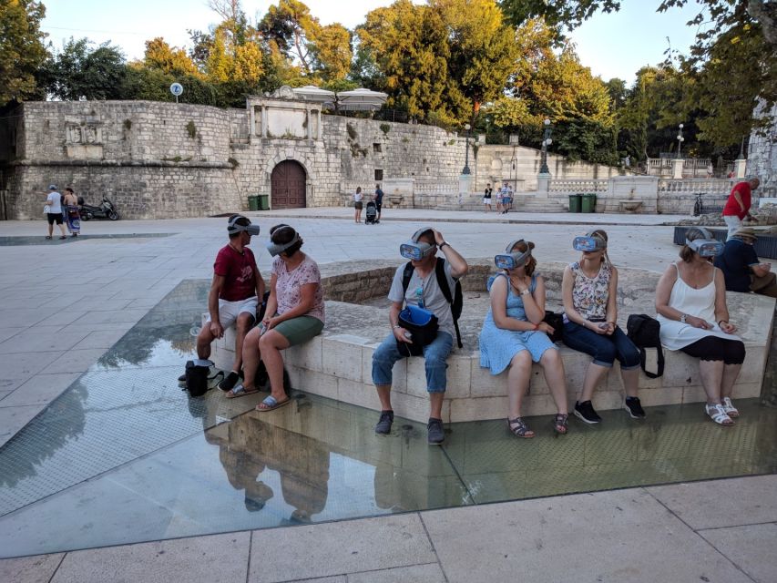 Zadar: Virtual Reality Guided History Walking Tour - The Role of the Assistant and the Audio Guide in Making It Work